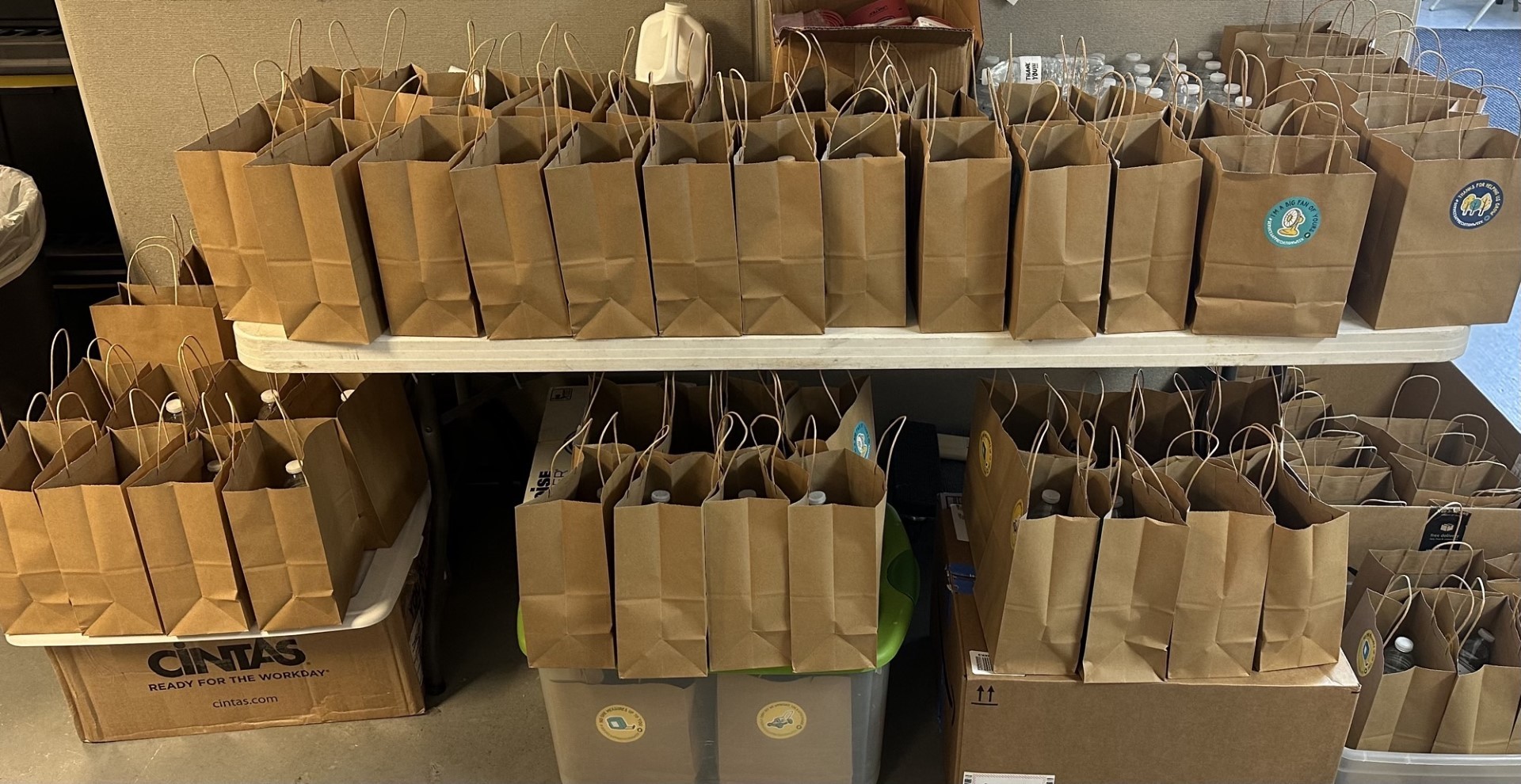 A photo of a table full of gift bags at Bentonville