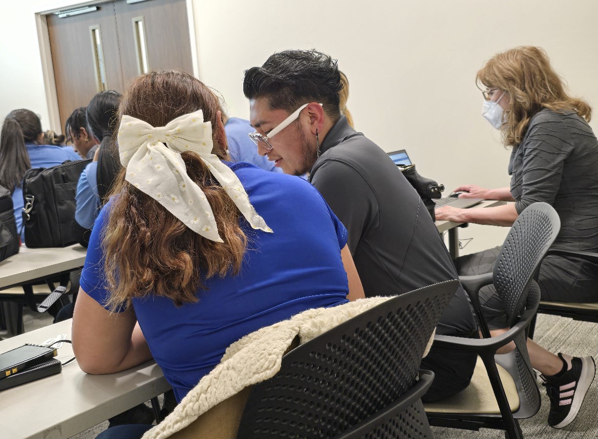 A photo of TouchPoint associates learning ESL